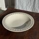 Set of a salad bowl and a vintage brown circular dish D28.