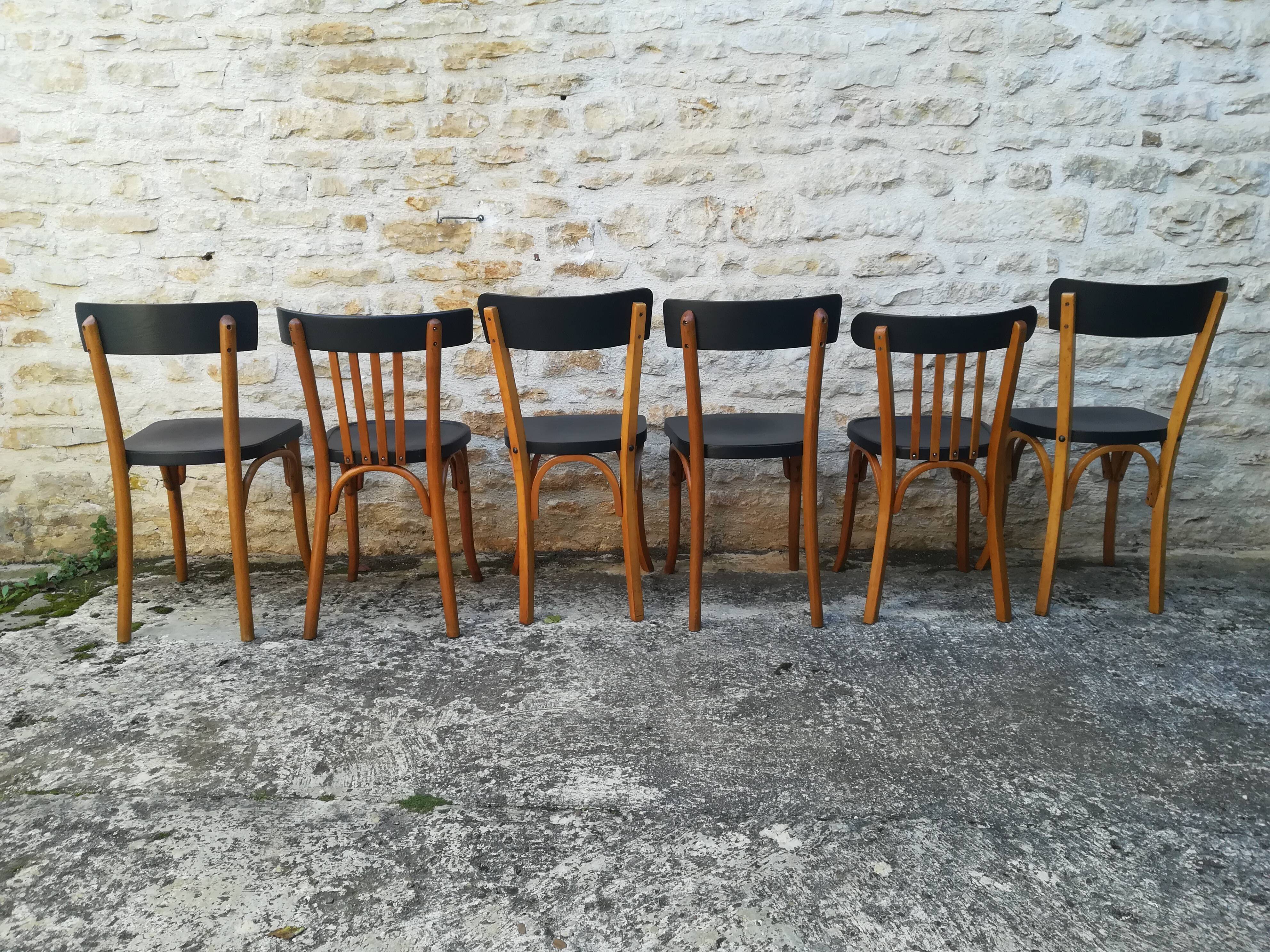 12 mismatched bistro chairs