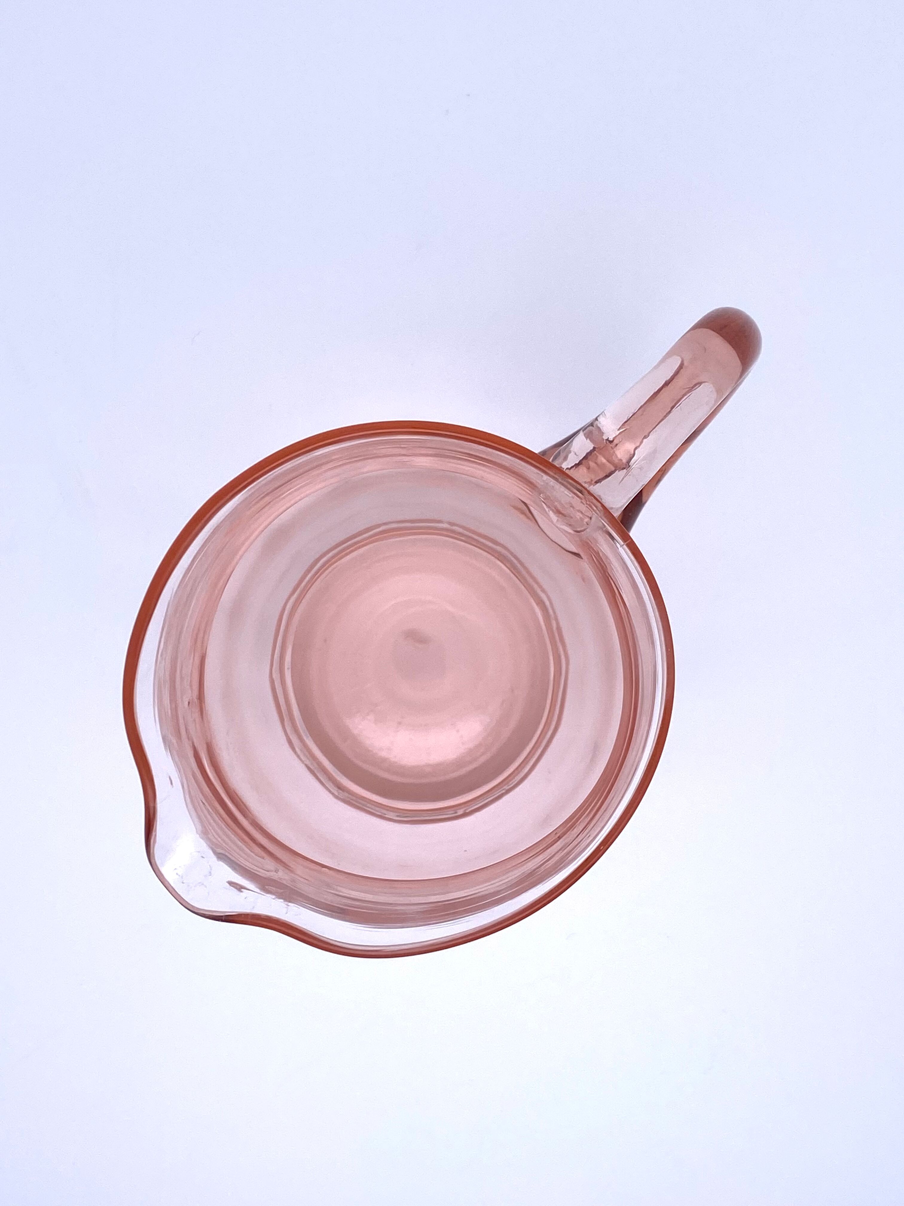 Rounded pink glass decanter