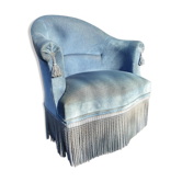 Fauteuil crapaud velours bleu à franges et pompons