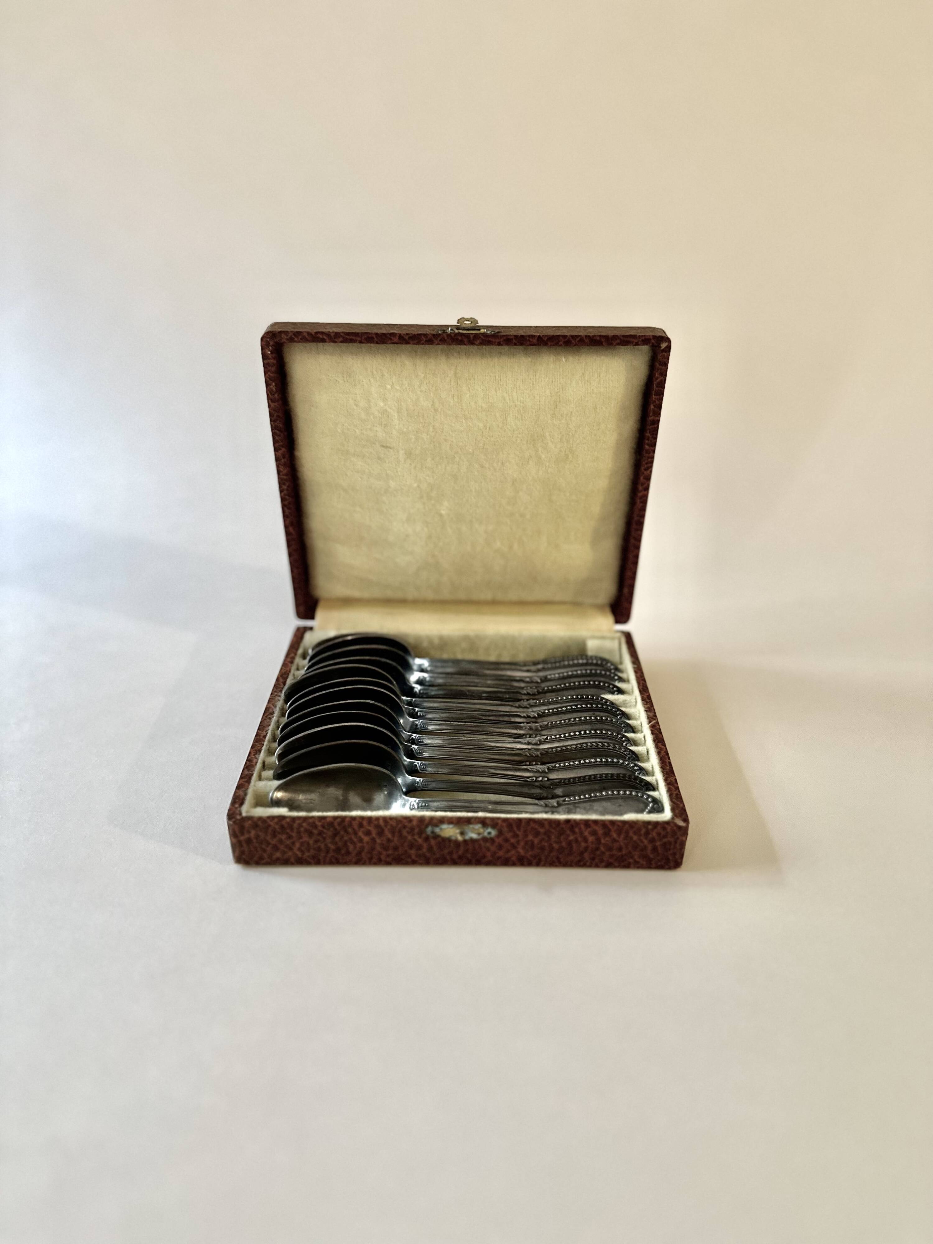 Service of 12 silver-plated dessert spoons