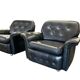 Set of 2 vintage black leather armchairs / individual armchairs