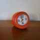 Vintage mechanical alarm clock in orange plastic Uti West Germany