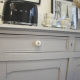Parisian buffet with 2 doors and 2 drawers in patinated grey.