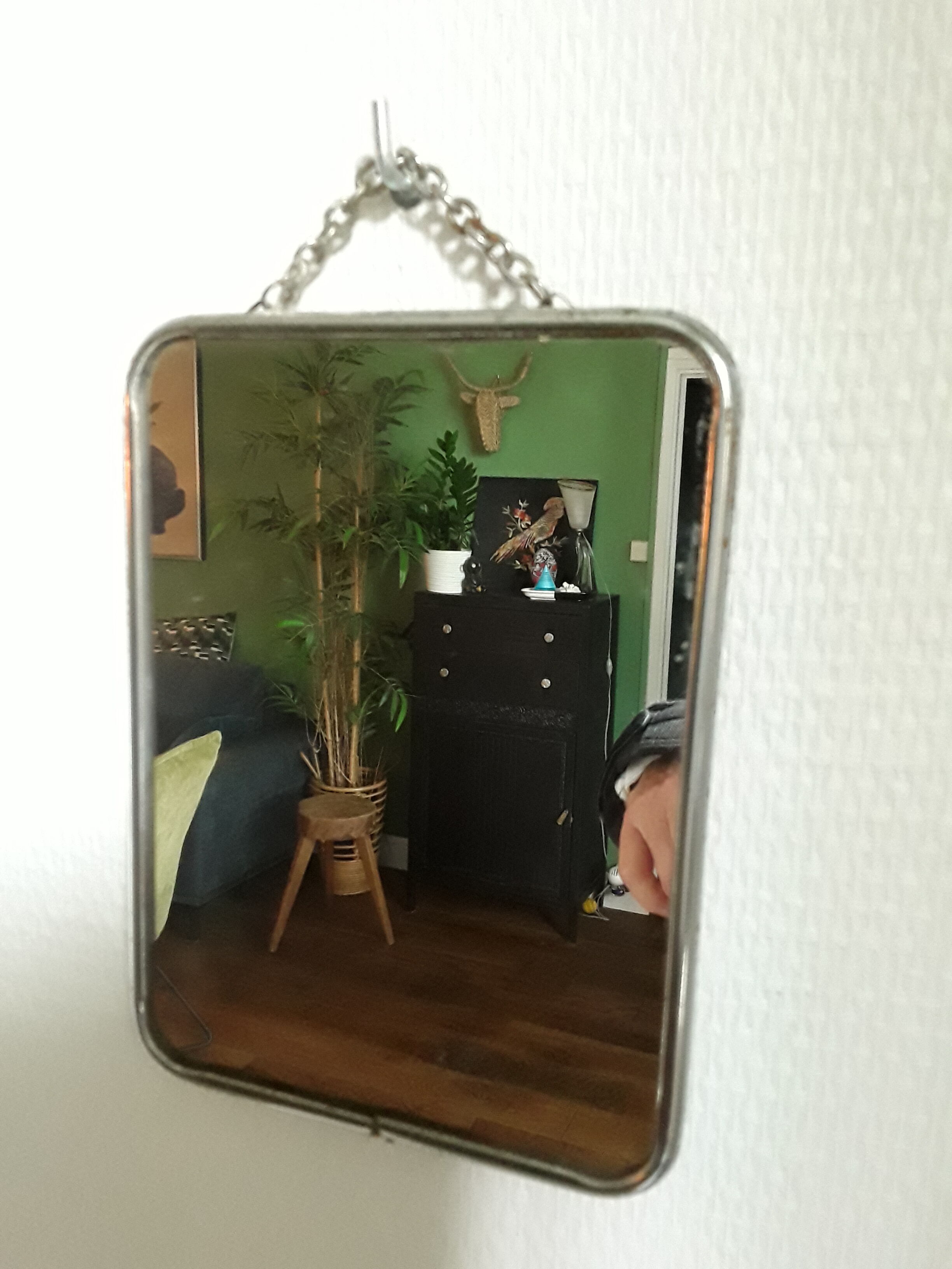Vintage barber mirror with chain