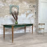 Vintage farm table with spindle legs.