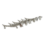 6 dog-shaped knife rests, in silver-plated metal.