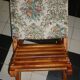 Rests wooden feet and folding tapestry