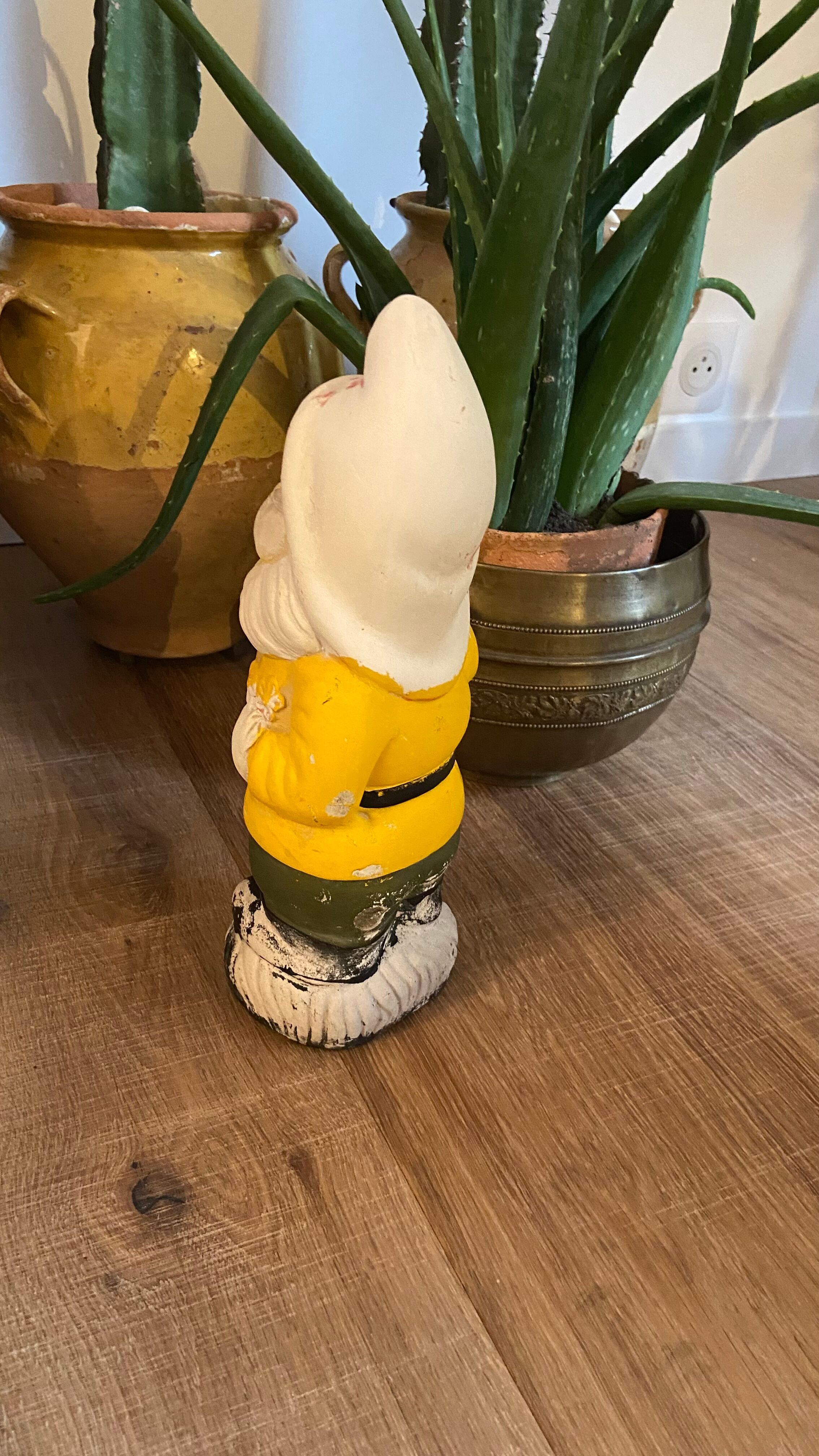 Ancient terracotta garden gnome