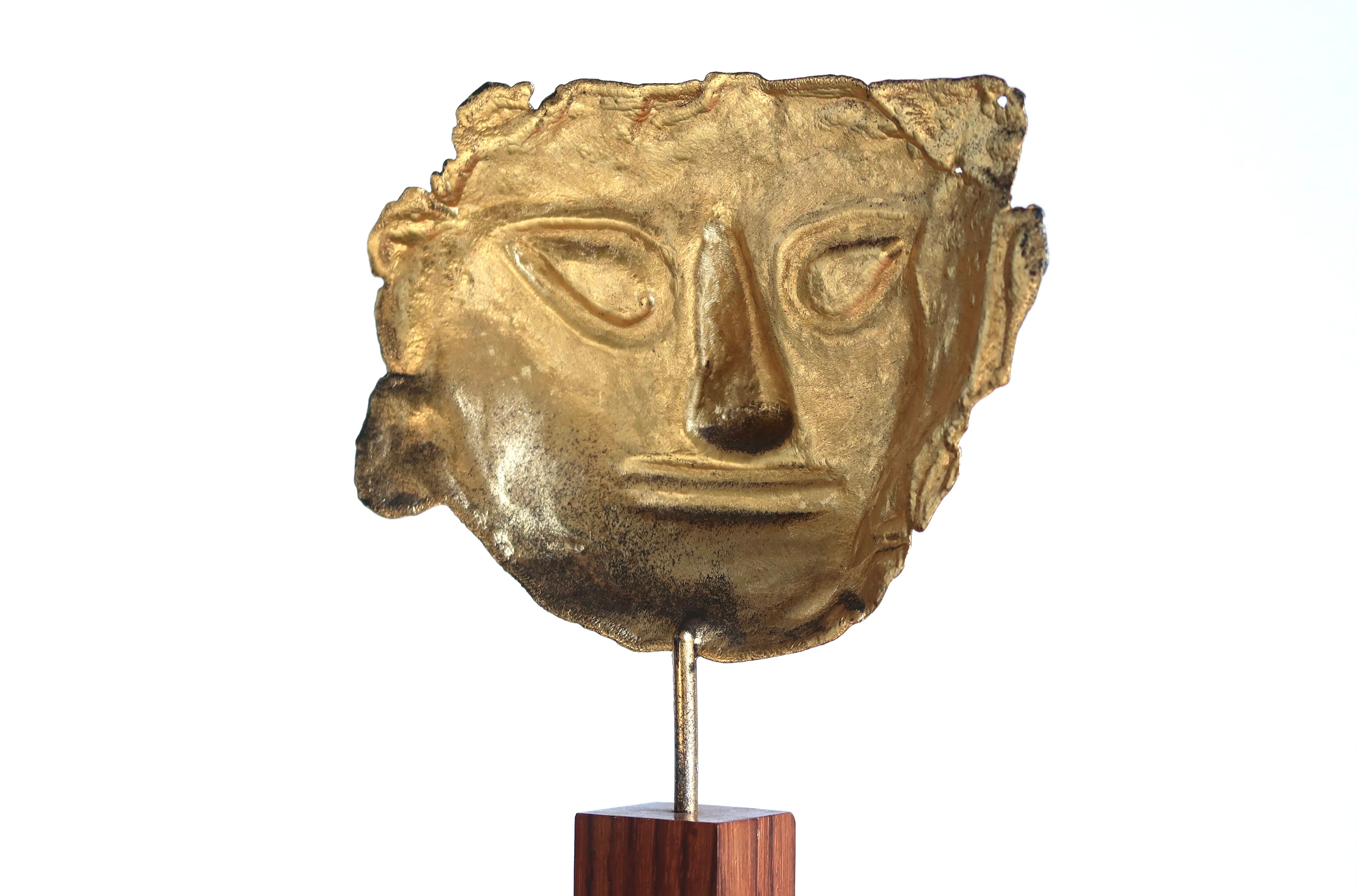 Mayan mask sculpture in gilded metal, 70 cm