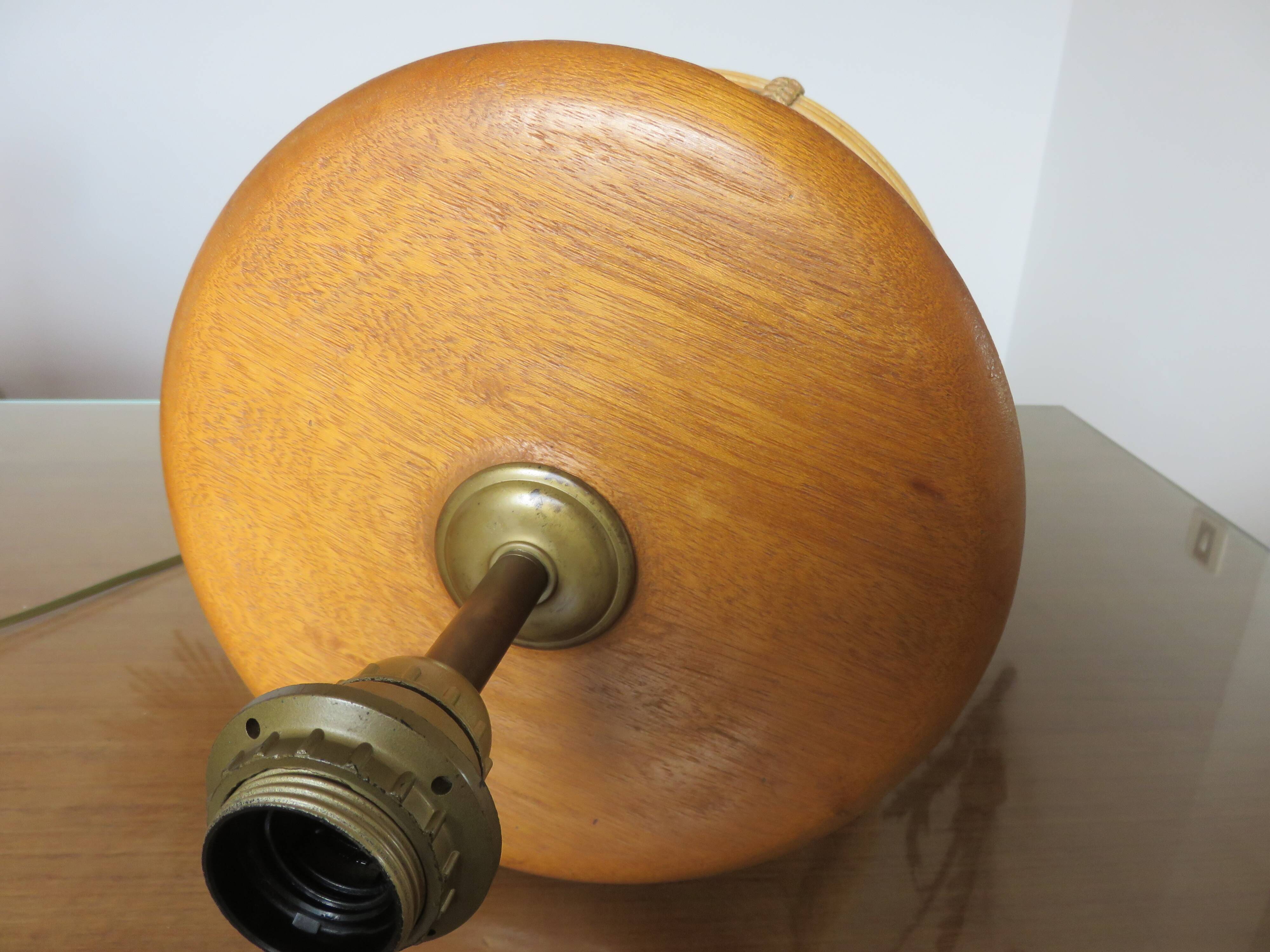 Rattan, leather, rope, and wood lamp in the style of Gabriella Crespi 60-70.