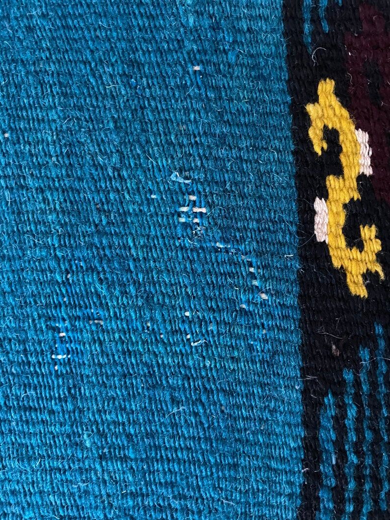 Romanian handwoven carpet with blue ground and yellow details