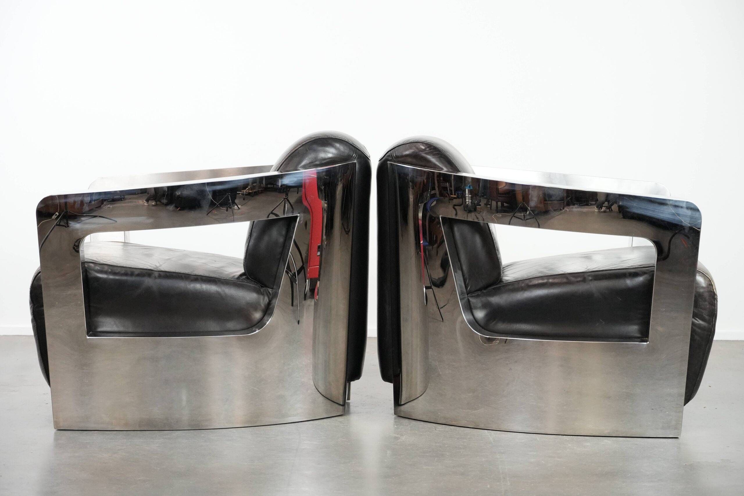 Set of two cowhide leather Aviator design armchairs with aluminium