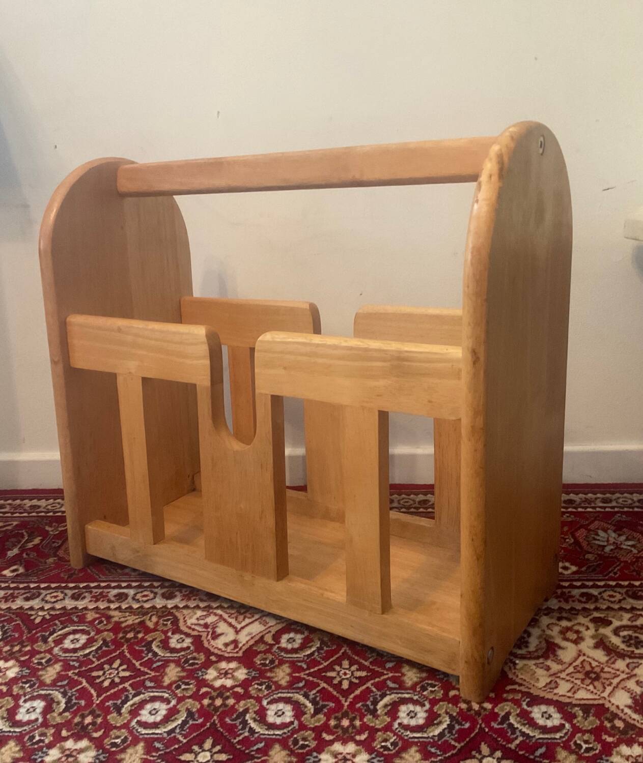 Vintage magazine rack in blond wood