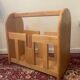 Vintage magazine rack in blond wood