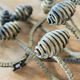 Set of six hammered Art Deco coat hooks