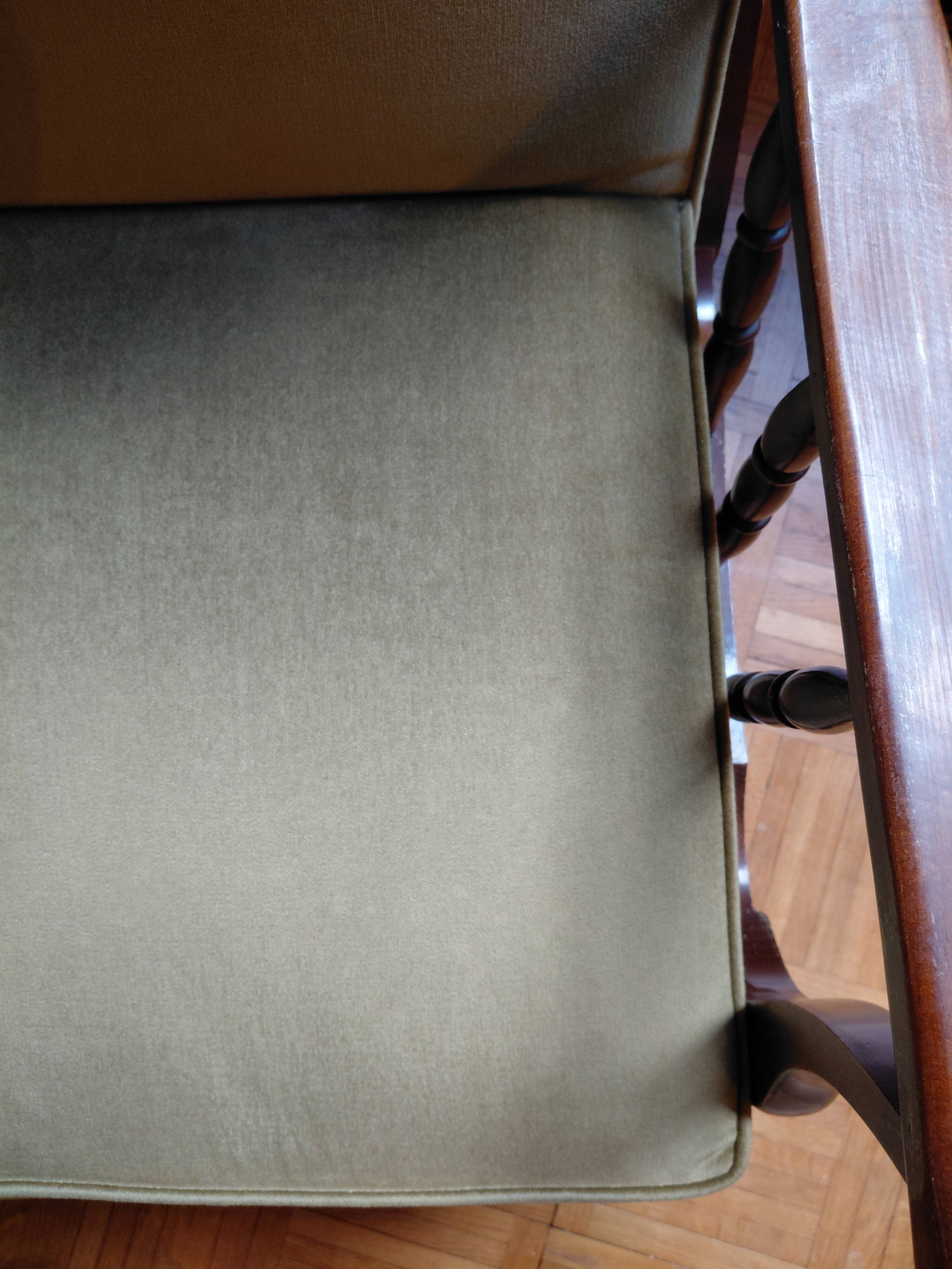 Lot of 2 olive green velvet armchairs.