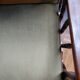 Lot of 2 olive green velvet armchairs.