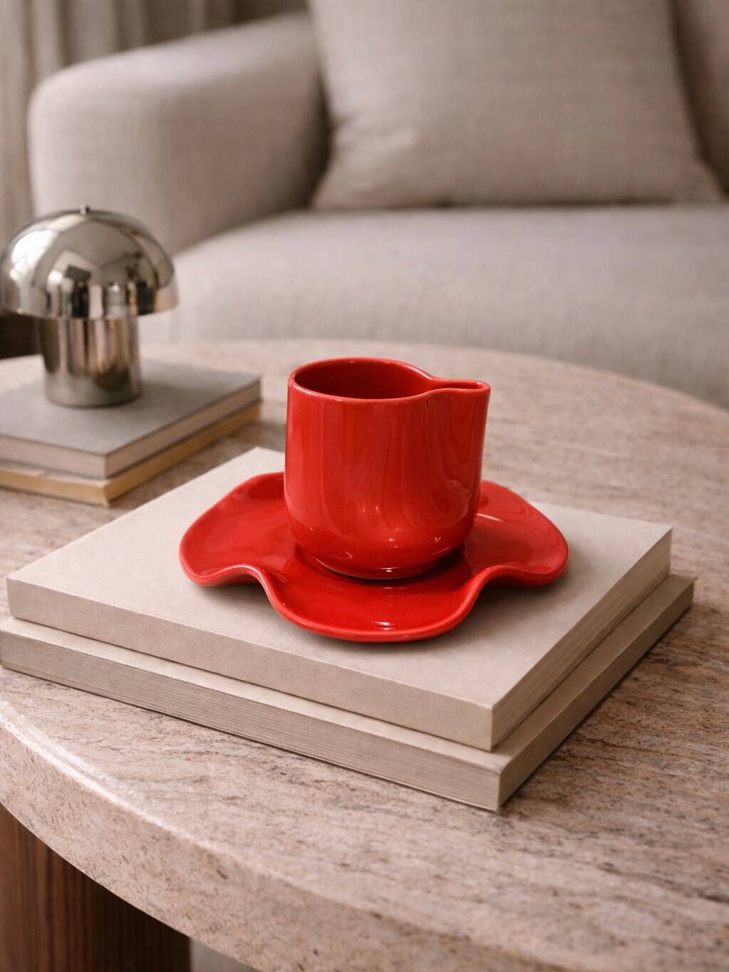 Set of wavy ceramic cup and saucer - poppy red