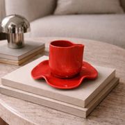 Set of wavy ceramic cup and saucer - poppy red