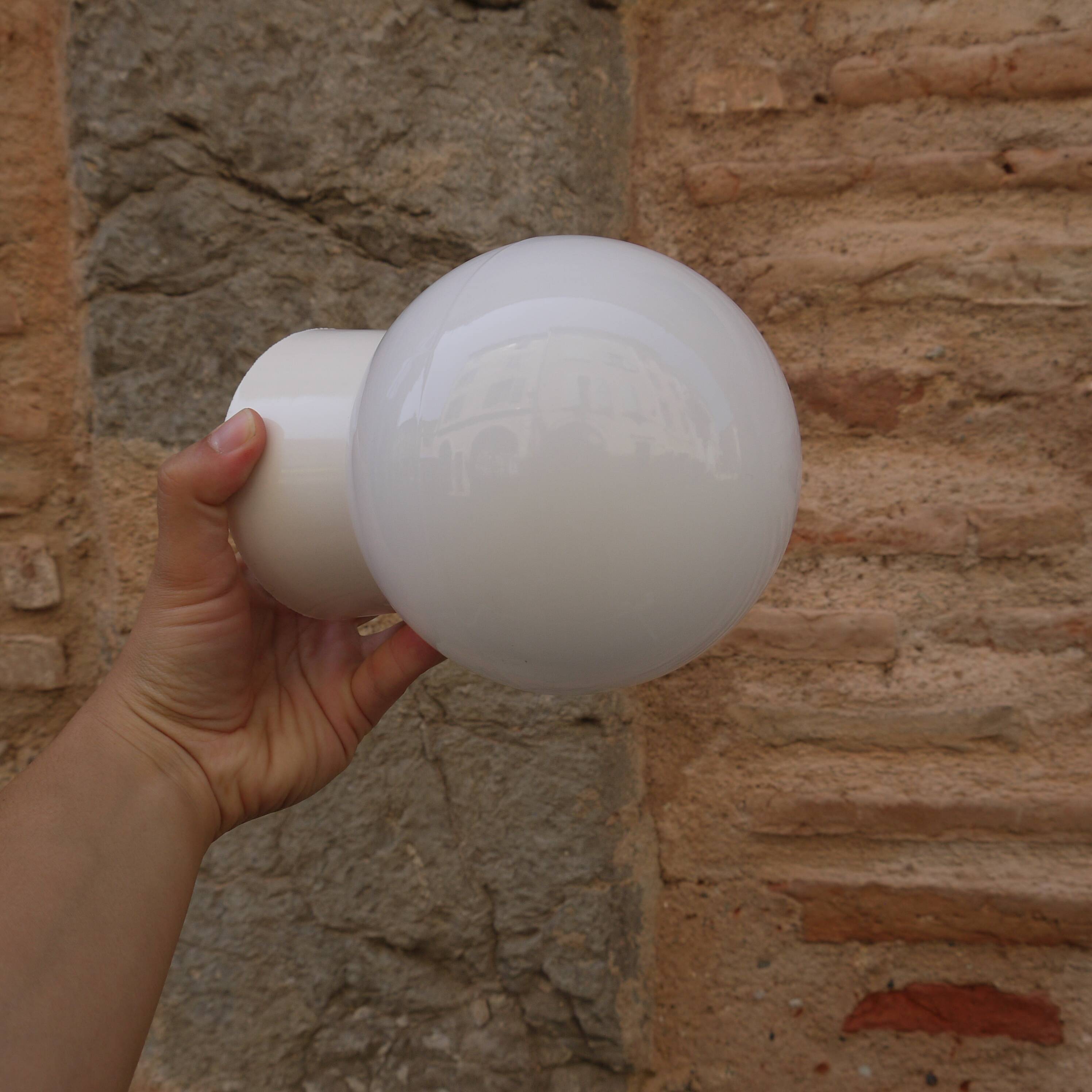 White globe sconce