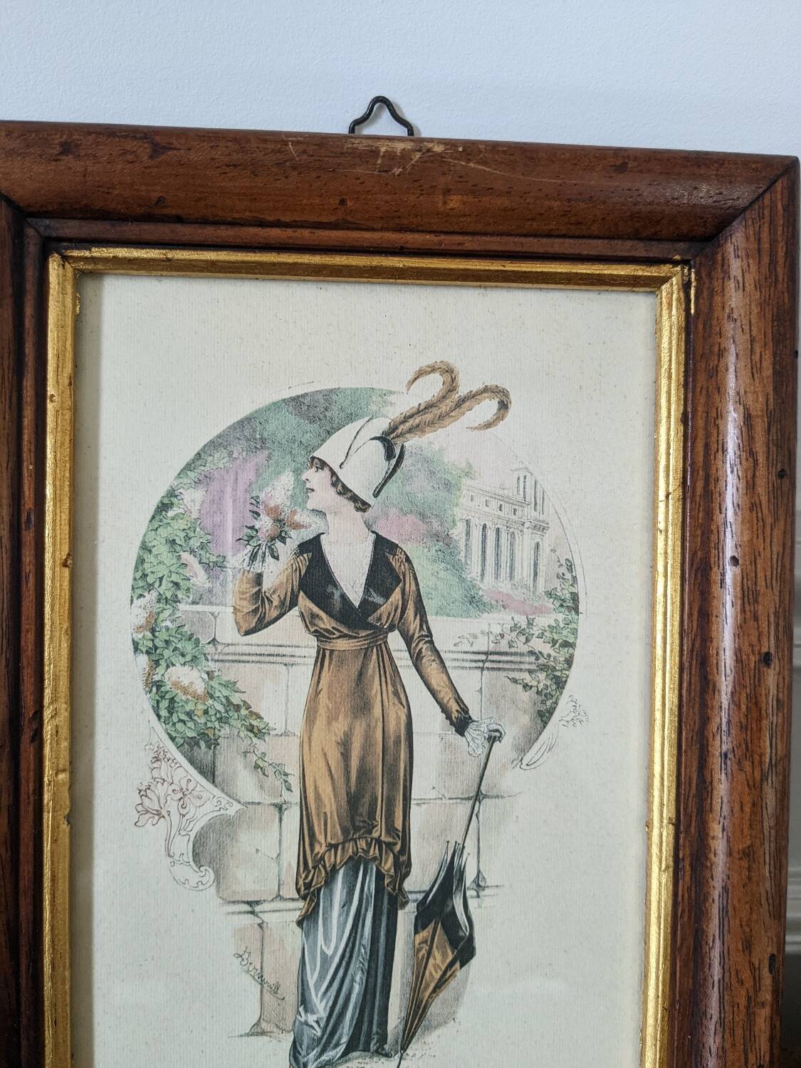Two reproduction frames of engravings