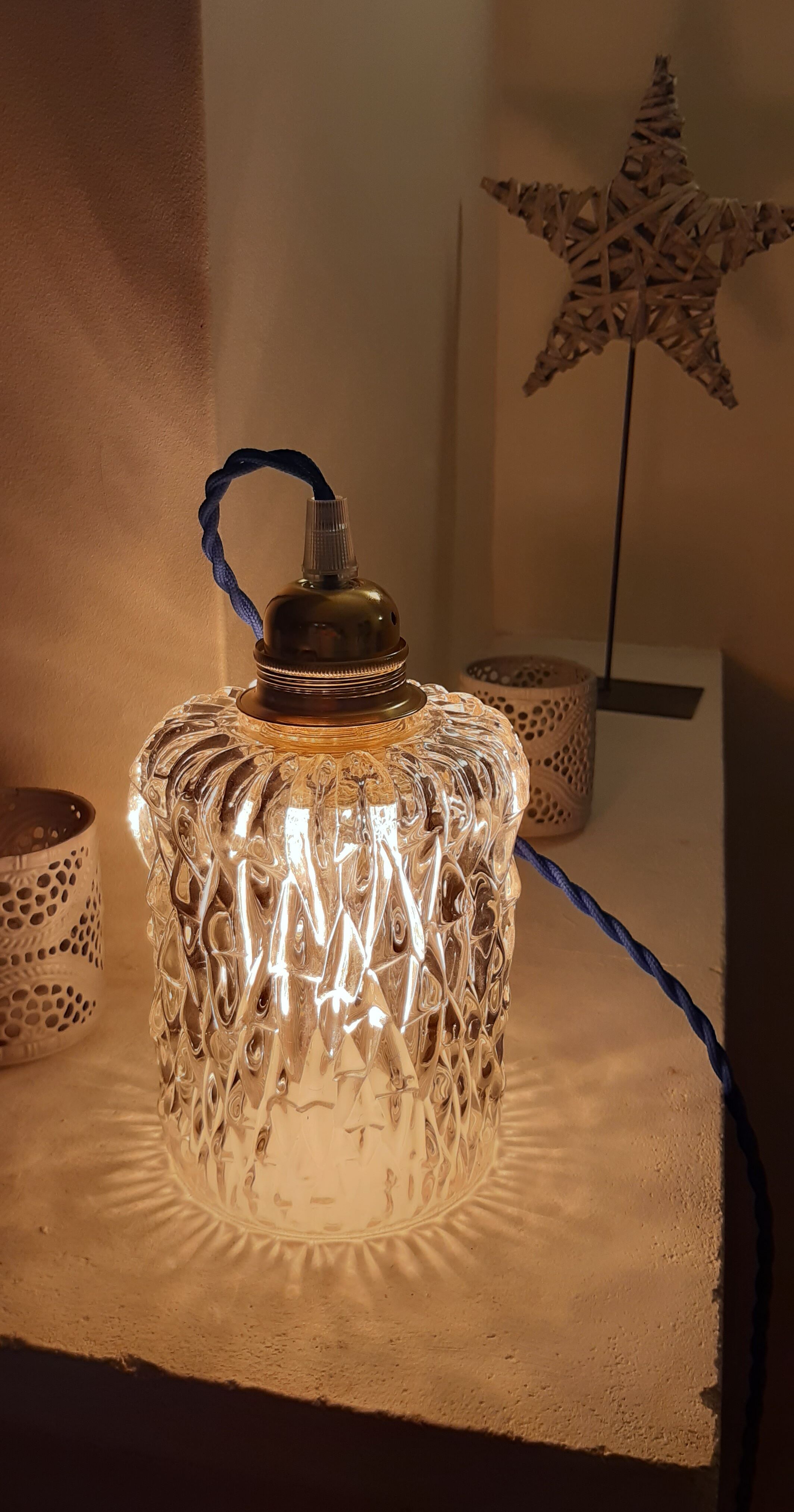 Chiseled glass hand lamp