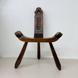 Brutalist hand carved oak Spanish tripod chair , 1970s