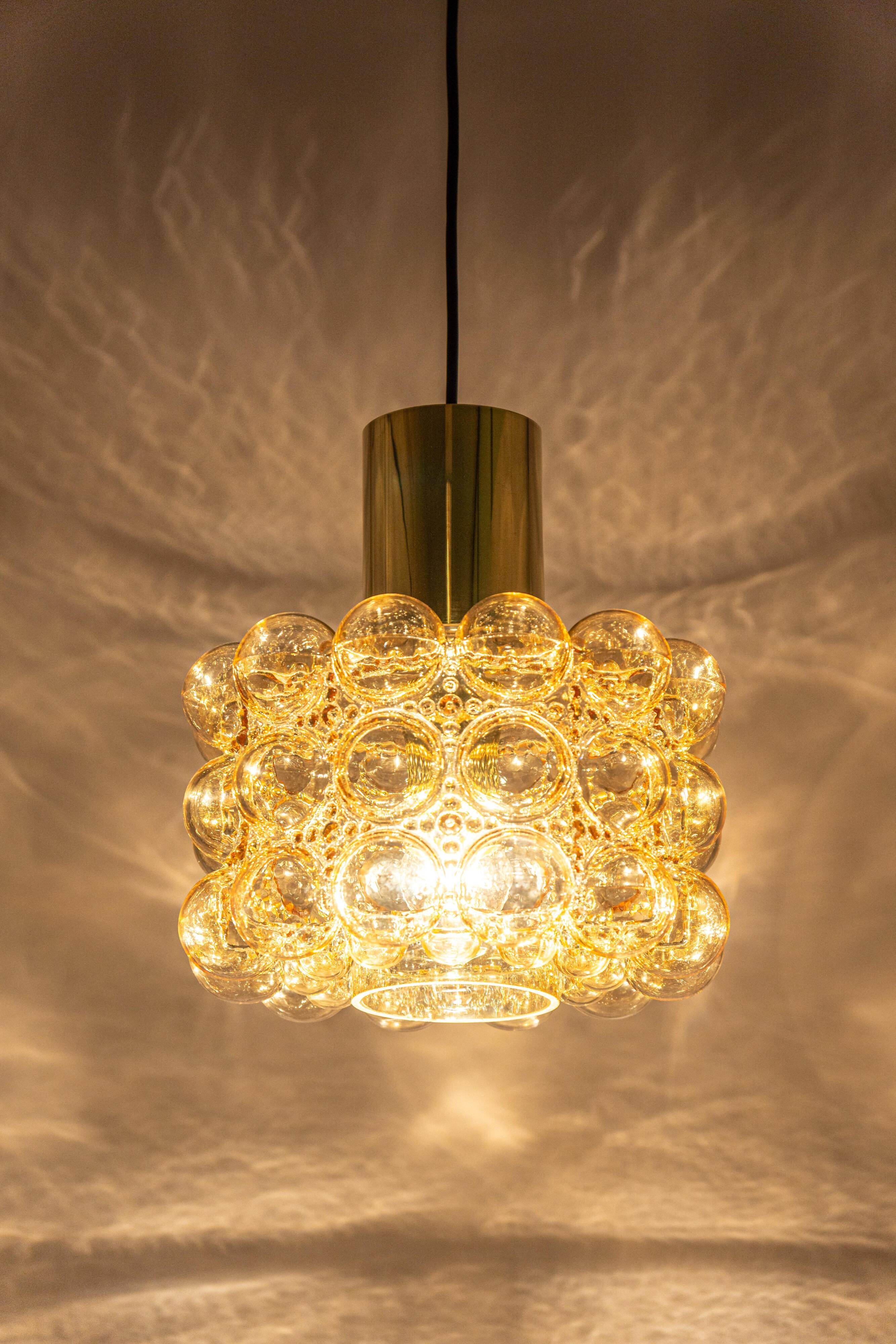 Large amber bubble glass pendant by Helena Tynell for Limburg, Germany, 1970s.