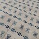 White and blue rug with Berber patterns, hand-woven in natural wool
