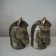 Set of two horse head candle holders.