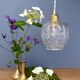 Suspension globe vintage en verre moulé transparent