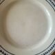 Old opaque porcelain plate gien terre de fer "laurels"