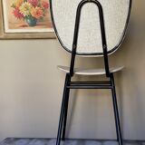 Chaise skaï moucheté et pieds tubes de métal noirs années 50