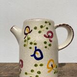 Ceramic water pitcher decorated with flowers
