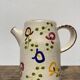 Ceramic water pitcher decorated with flowers