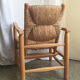 "Paillé" armchair by Charlotte Perriand