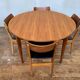 Round table in teak with vintage butterfly extension from the 1960s
