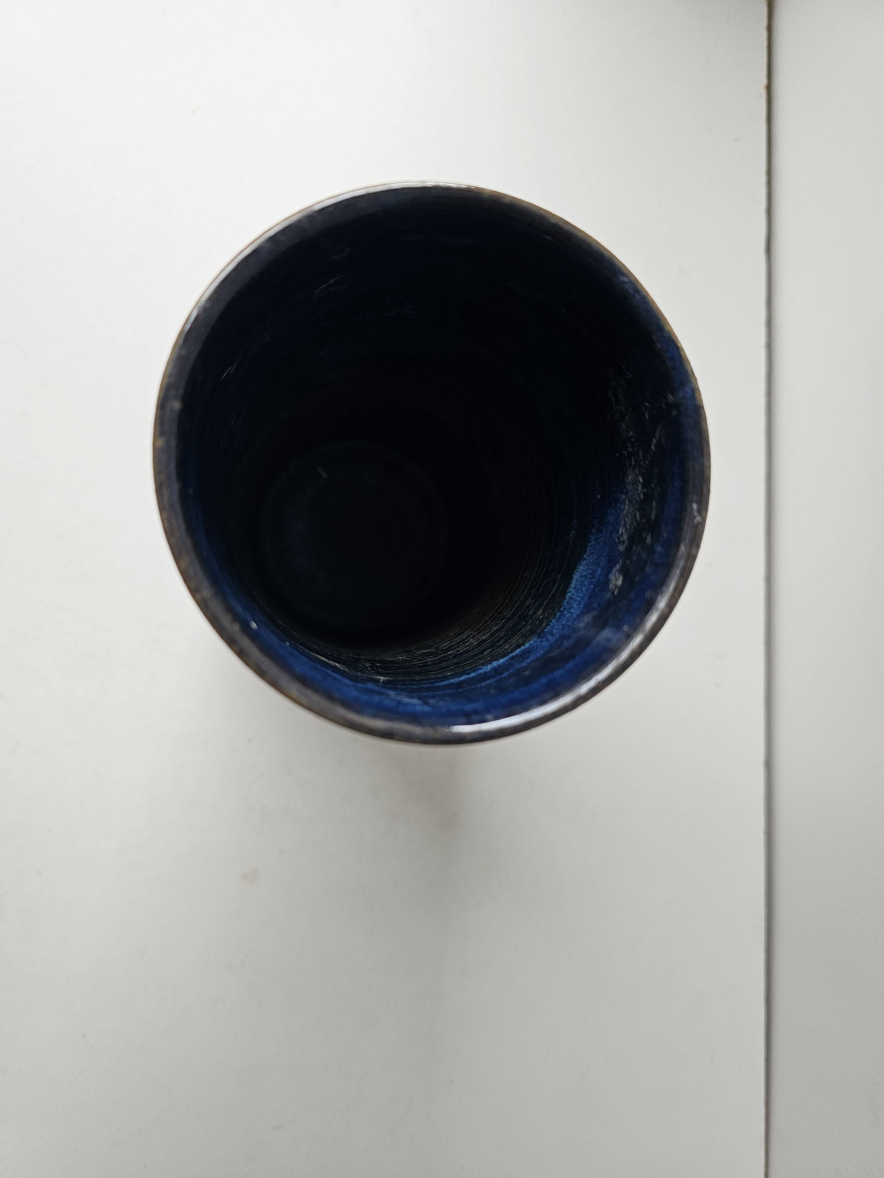 Blue ceramic vase with roller signed AB (signature to be identified)