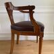 Vintage office chair in wood and brown studded leather late nineteenth