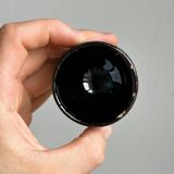 3 black ceramic egg cups with floral patterns