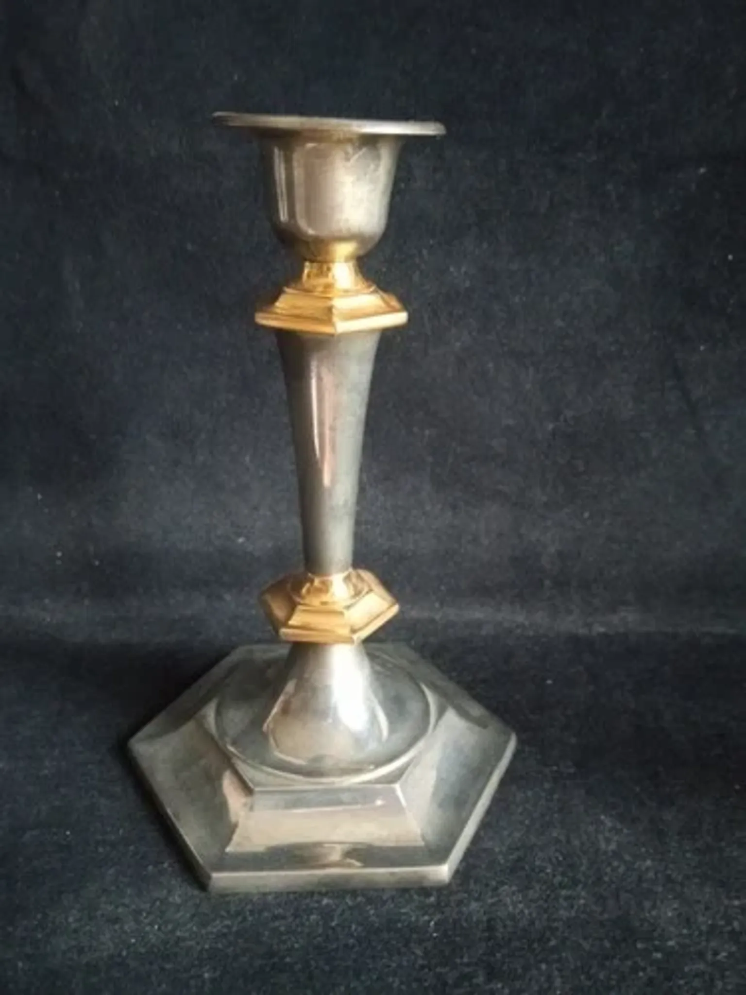 Pair of small English candlesticks in silver-plated metal and brass - 20th century.