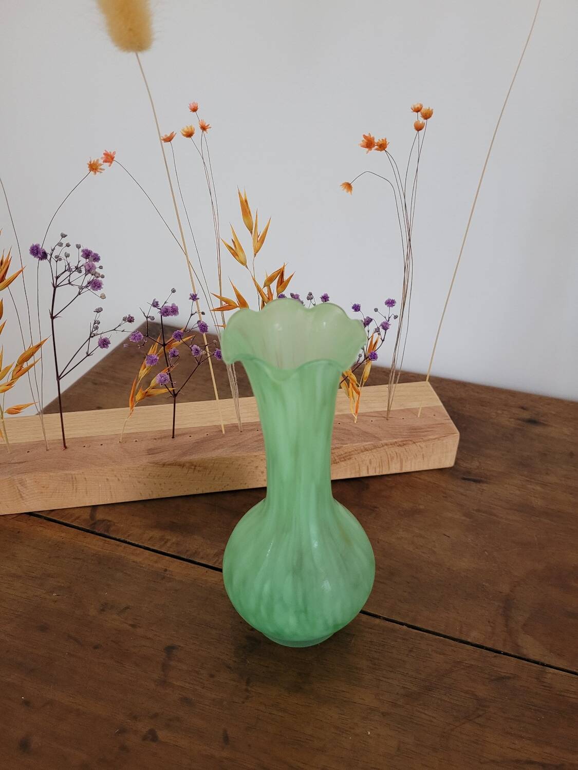 Green vase with high neck made of glass paste