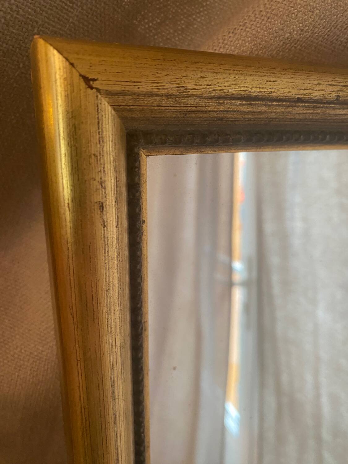 Large and old wooden mirror