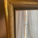 Large and old wooden mirror