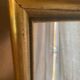 Large and old wooden mirror