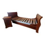 Bed with cherry wood base and bedside table