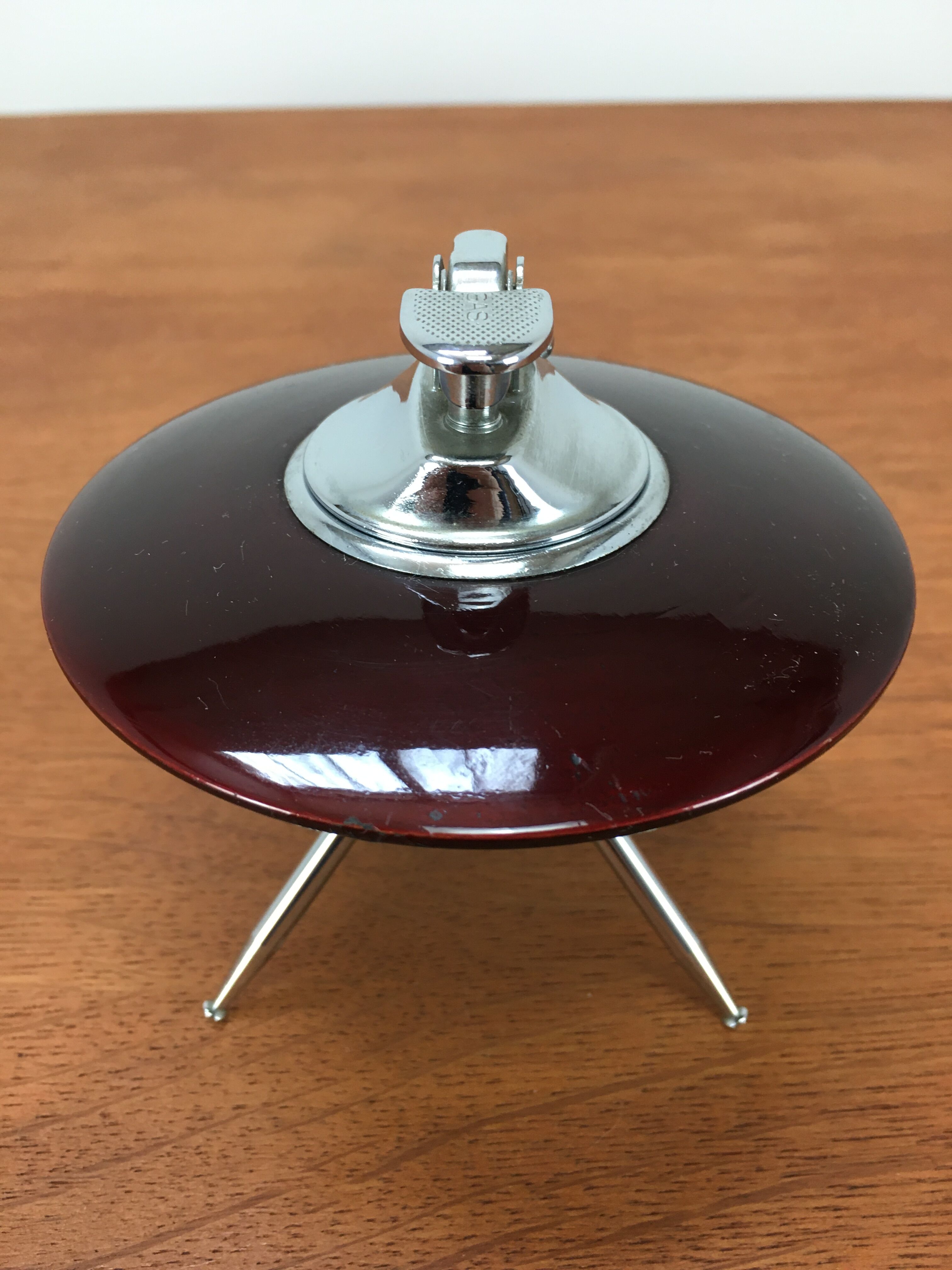 Spage age table lighter, tripod flying saucer