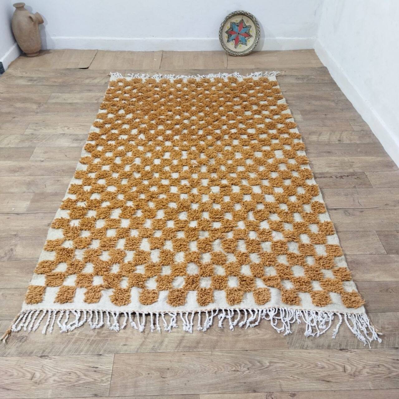 Moroccan Berber rug in ecru and camel wool with a graphic pattern, 245x150 cm.