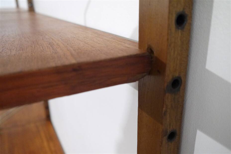 Danish wall shelving system in teak from the 1960s.